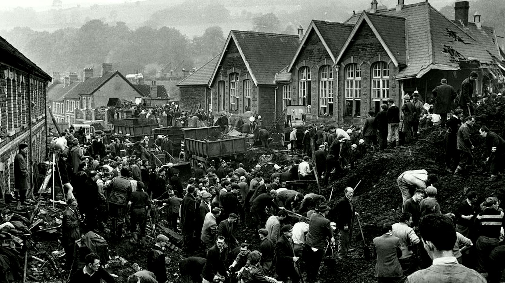 Locals search for survivors of Wales's worst ever mining disaster.