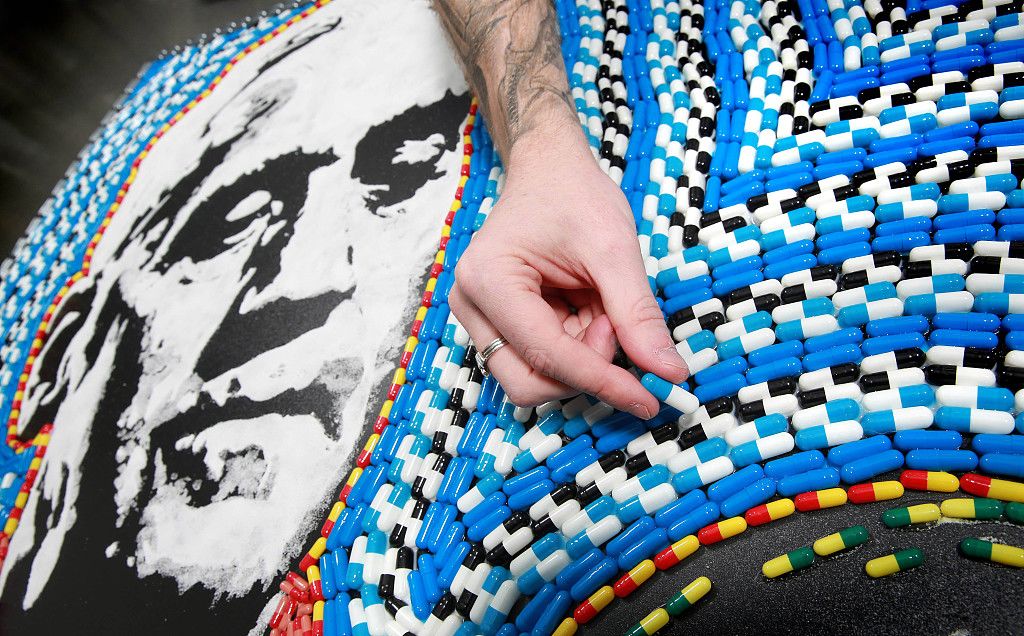 Artist Nathan Wyburn used empty capsules and powder to create a portrait of Alexander Fleming, the discoverer of penicillin.