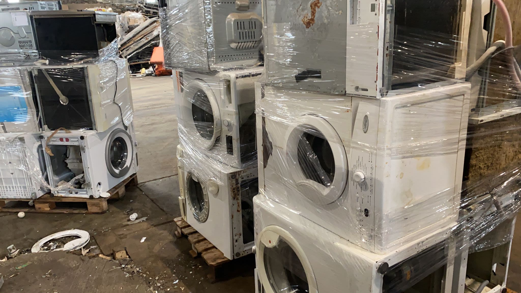 Inmates strip discarded washing machines for parts – and cash.