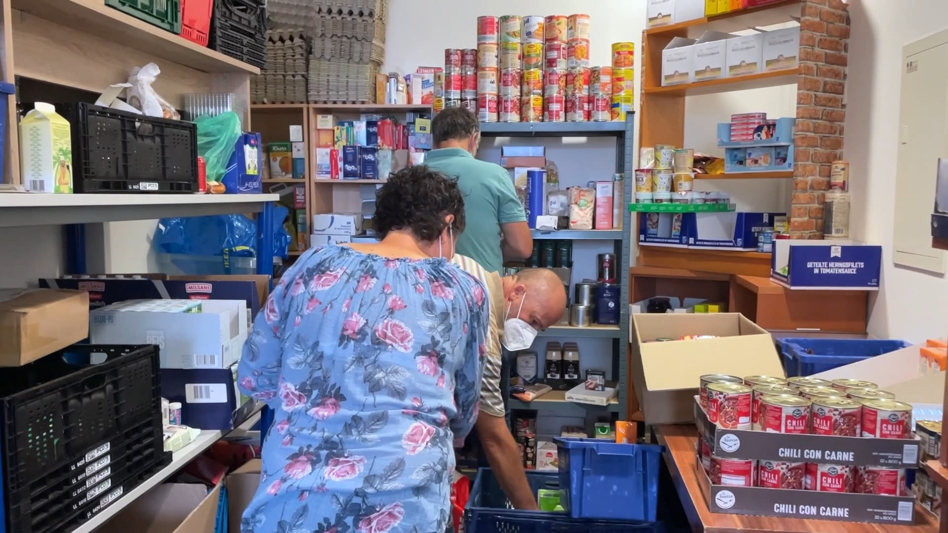 Some who once donated to food banks are now back asking for help. /CGTN