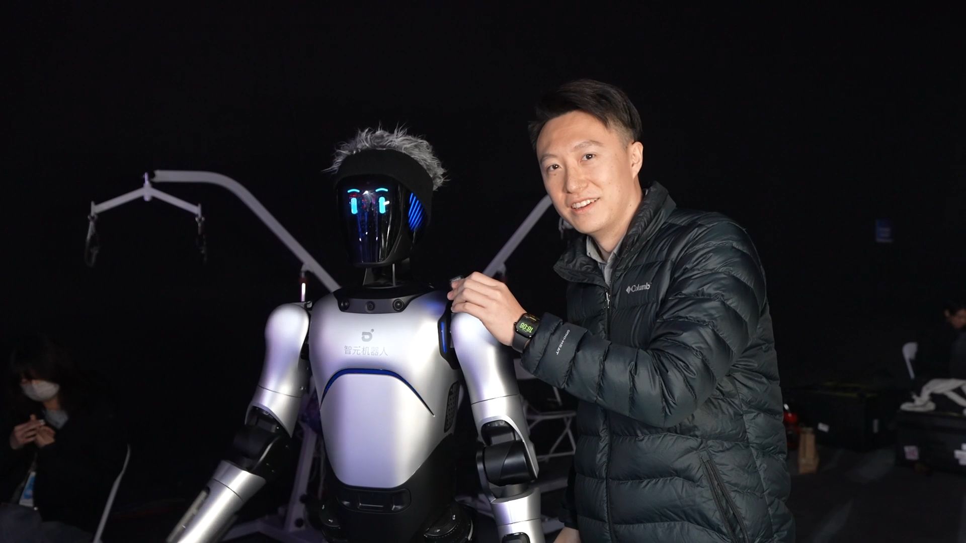 CGTN's Tianyu with a robot at the gala. 