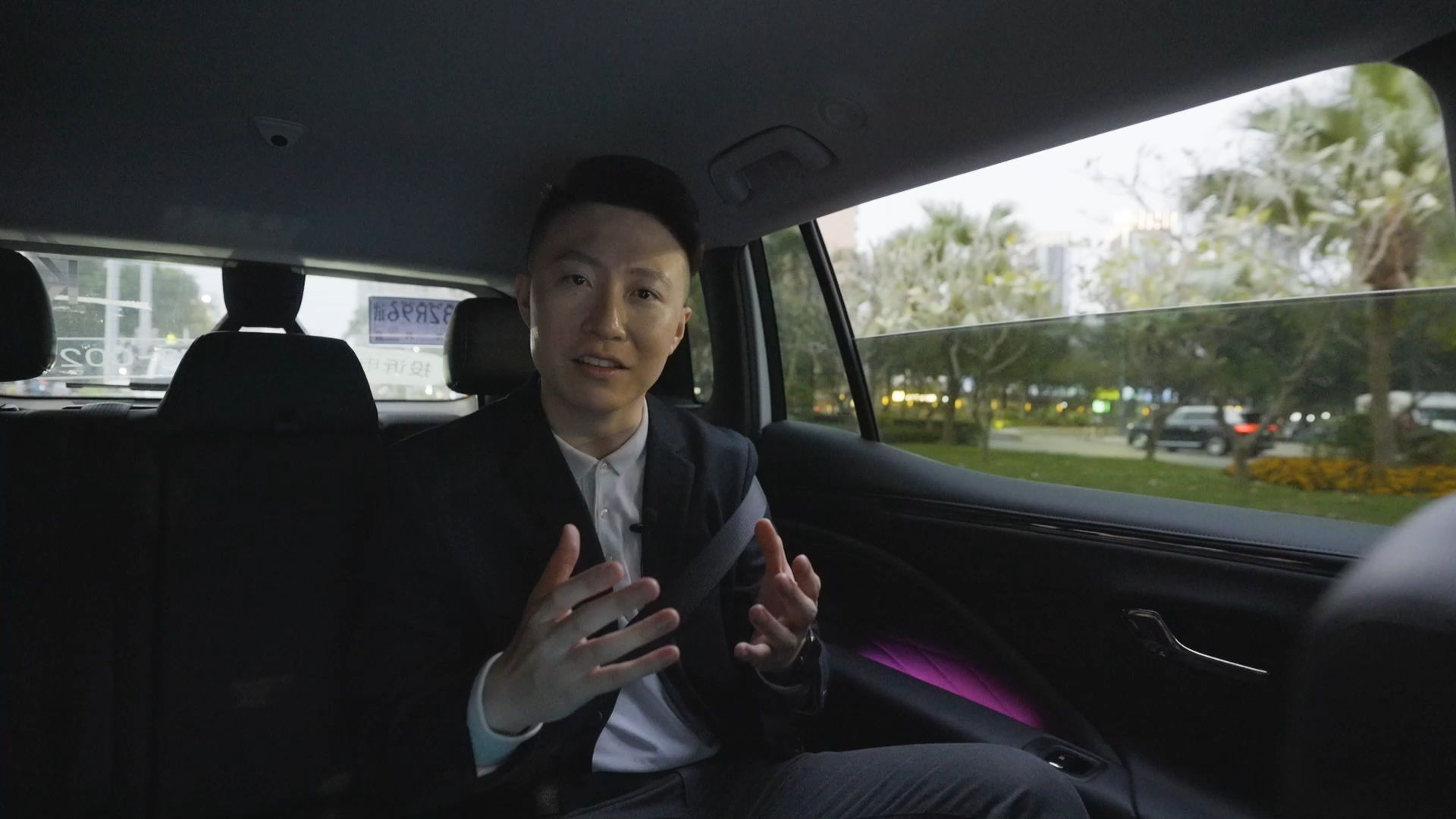 Tianyu relaxes in his robotaxi. 