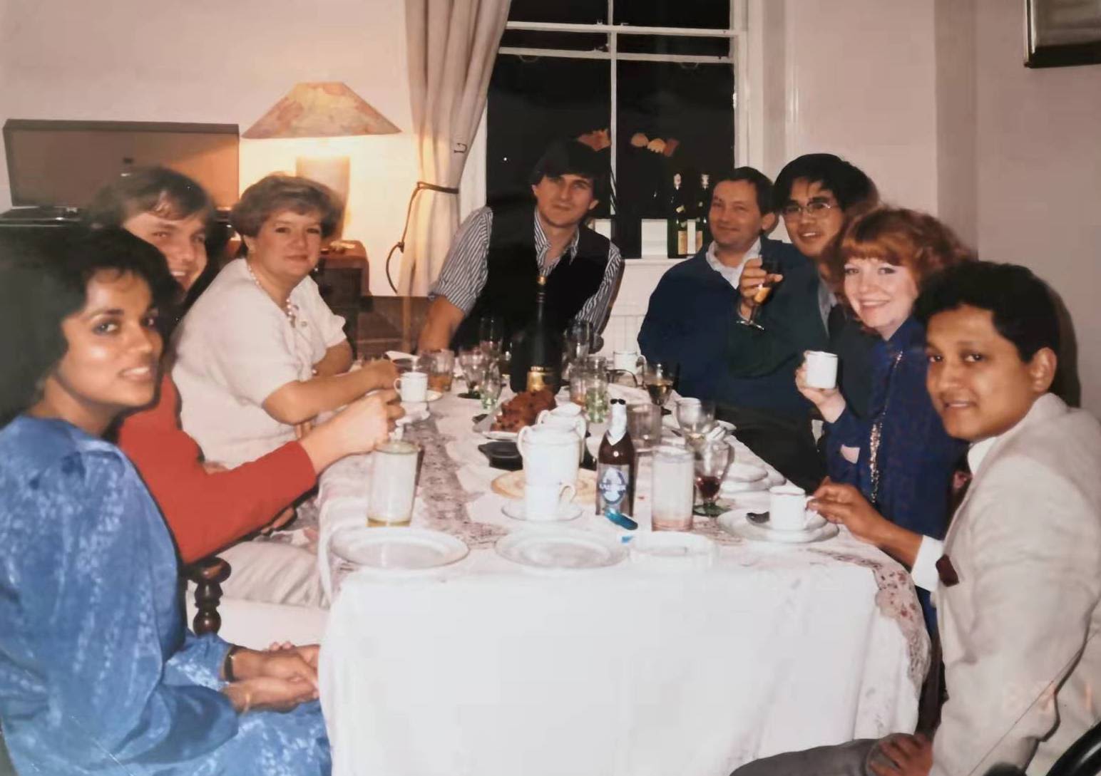 Liu (third from right) photographed at a party with London Export Corporation colleagues in 1989.