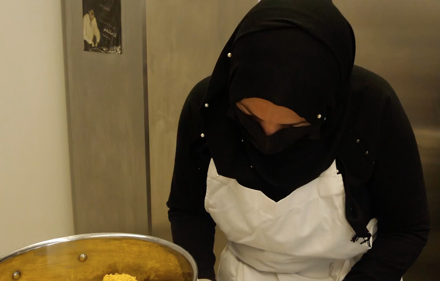 Before working at the restaurant, Alham and her family survived solely on government aid. /CGTN Europe