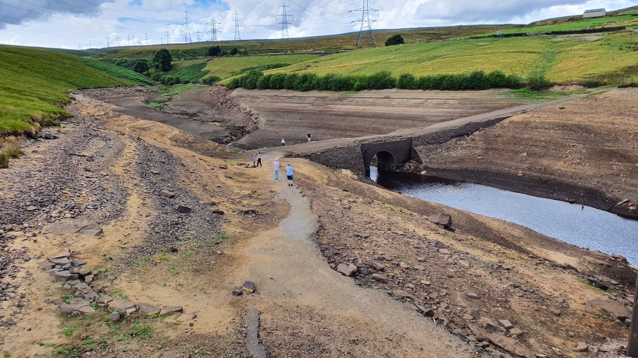 A long-lost bridge exposed by drought at Baitings Reservoir, Yorkshire.