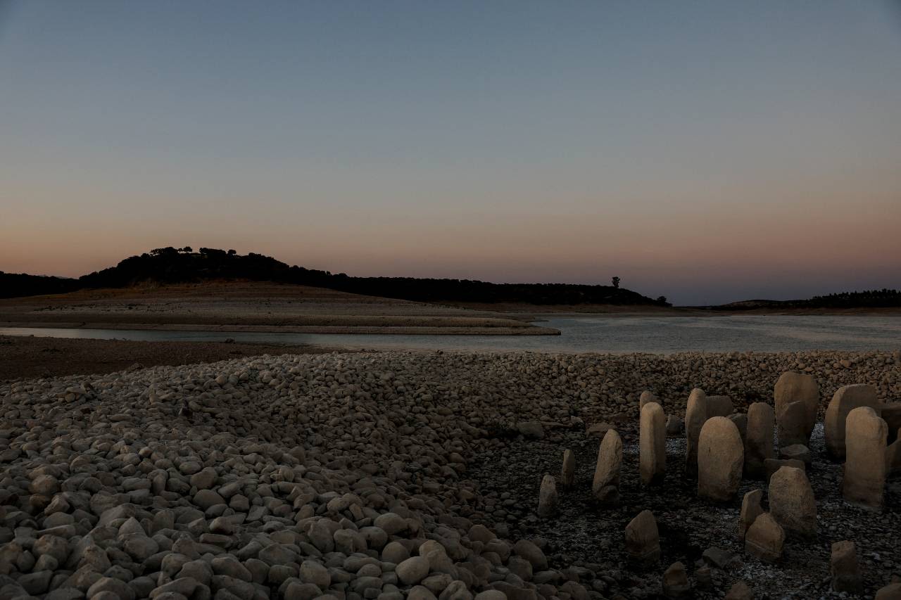 The dolmen of Guadalperal, also known as the Spanish Stonehenge, is seen due to receding waters at the Valdecanas reservoir. /Susana Vera/Reuters