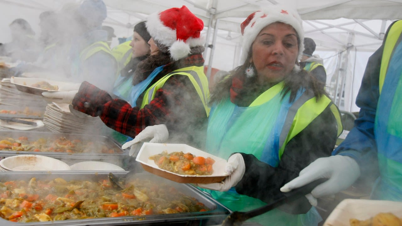 In London, volunteers served 5,000 free lunches from fresh food that would otherwise have been thrown away.