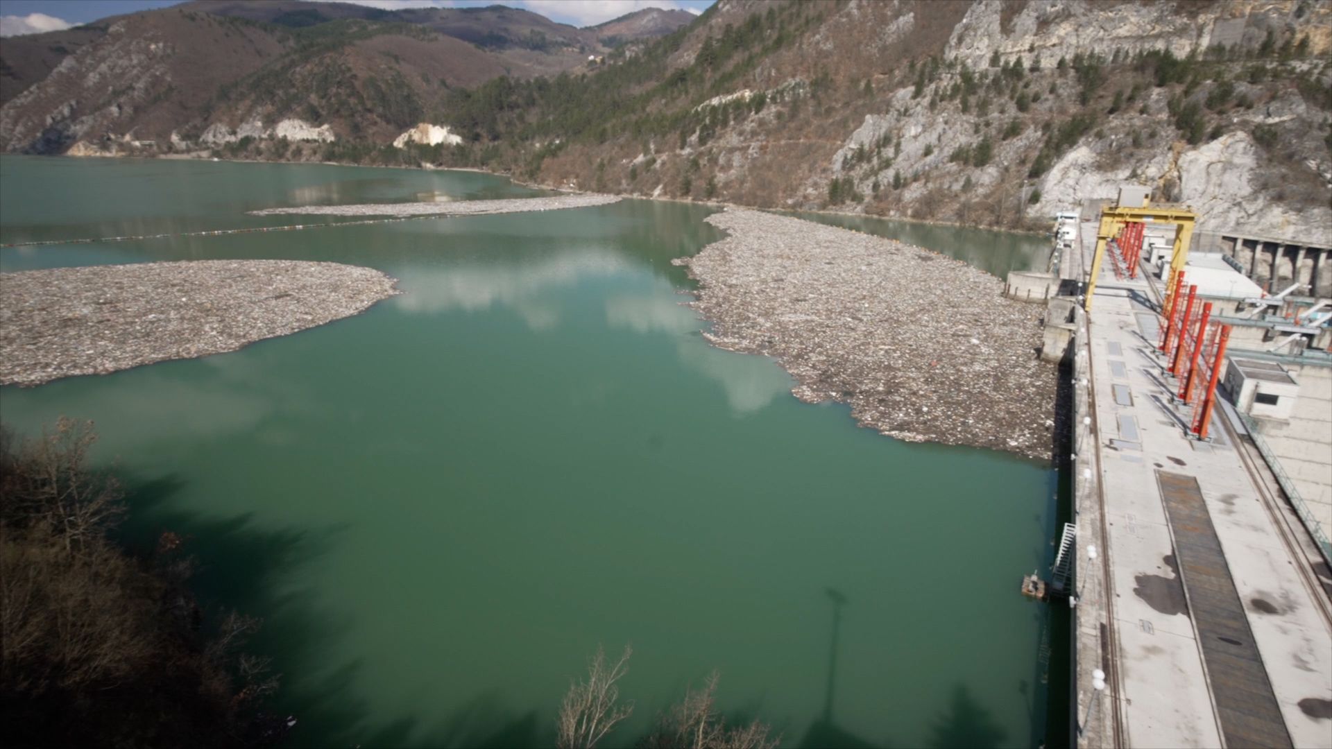 Multiple garbage islands collect behind the Visegrad dam.